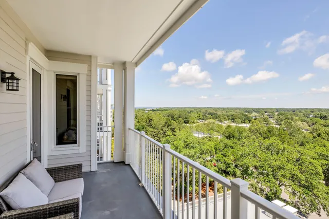 a view of a balcony with chair