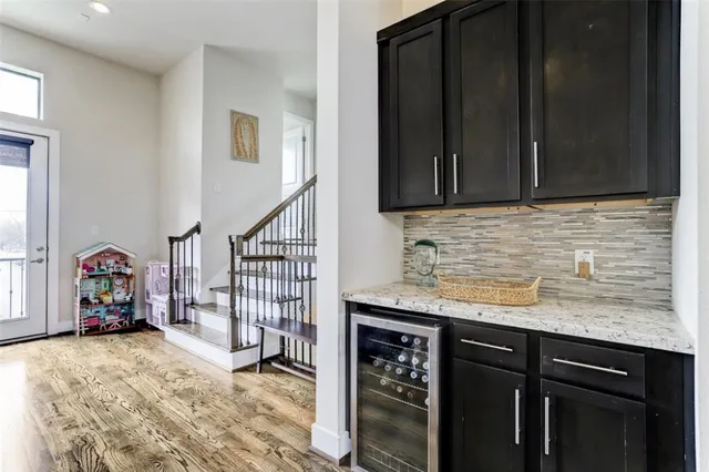 a bathroom with a toilet a sink and a mirror