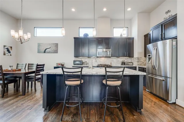 a view of a table and chairs in a room