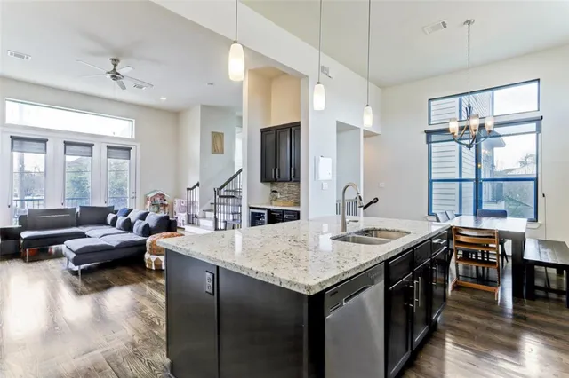 a view of entryway and livingroom with wooden floor