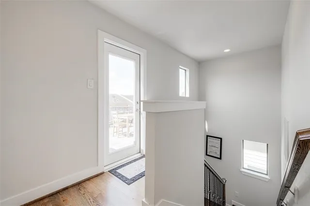 a terrace of a house with outdoor seating