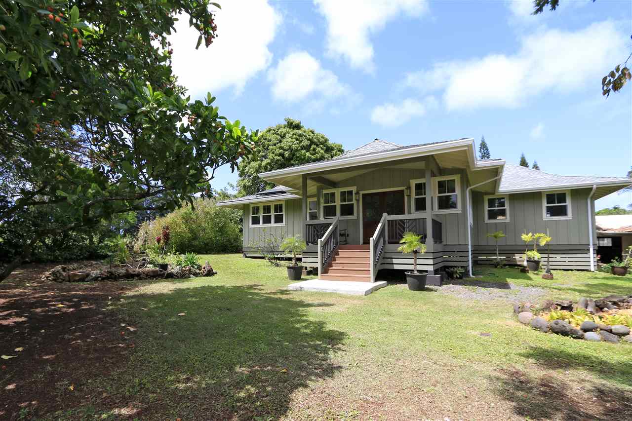 2736 Kaupakalua Road Haiku, HI 96708 - Photo 1 of 30 a view of a house with backyard porch and sitting area