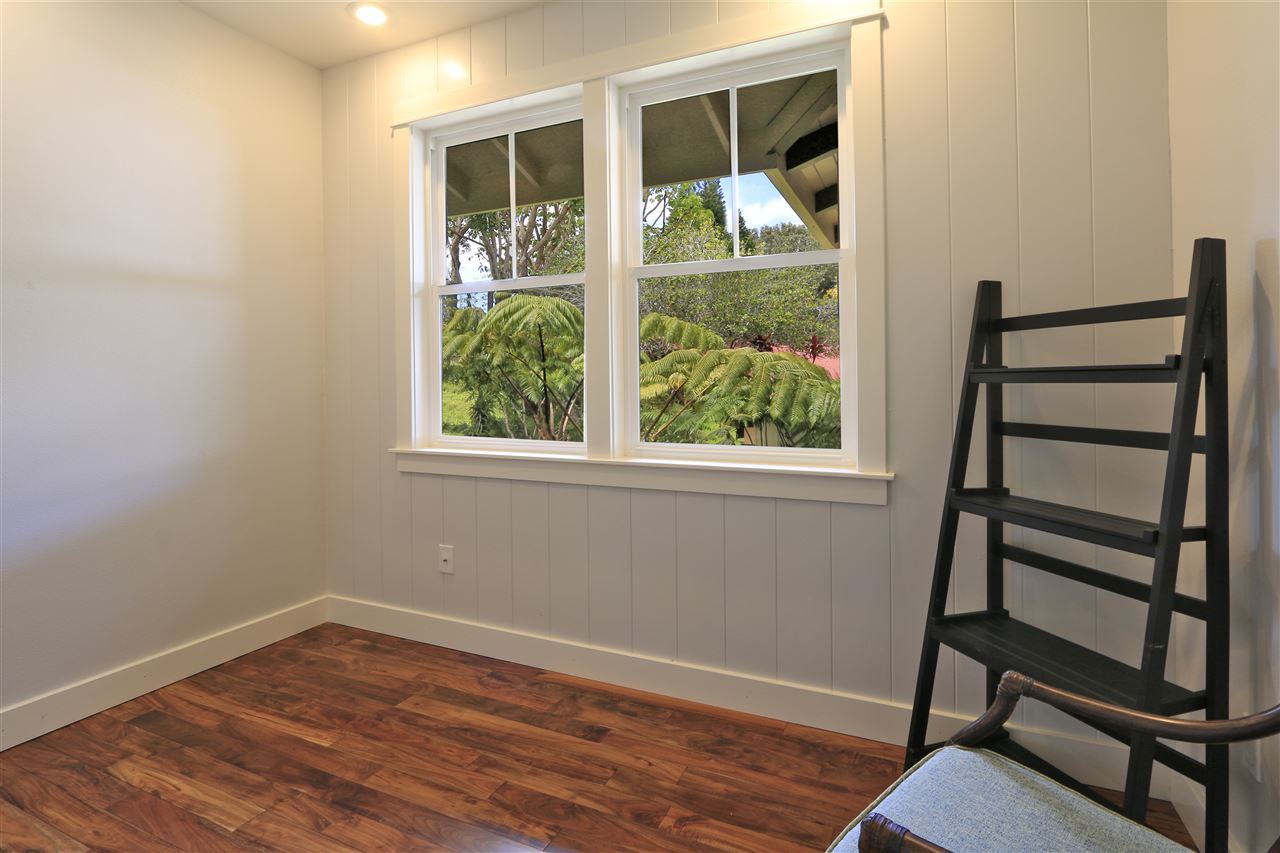 2736 Kaupakalua Road Haiku, HI 96708 - Photo 17 of 30 a view of empty room with wooden floor and fan