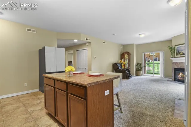 a bedroom with a bed and a cabinets