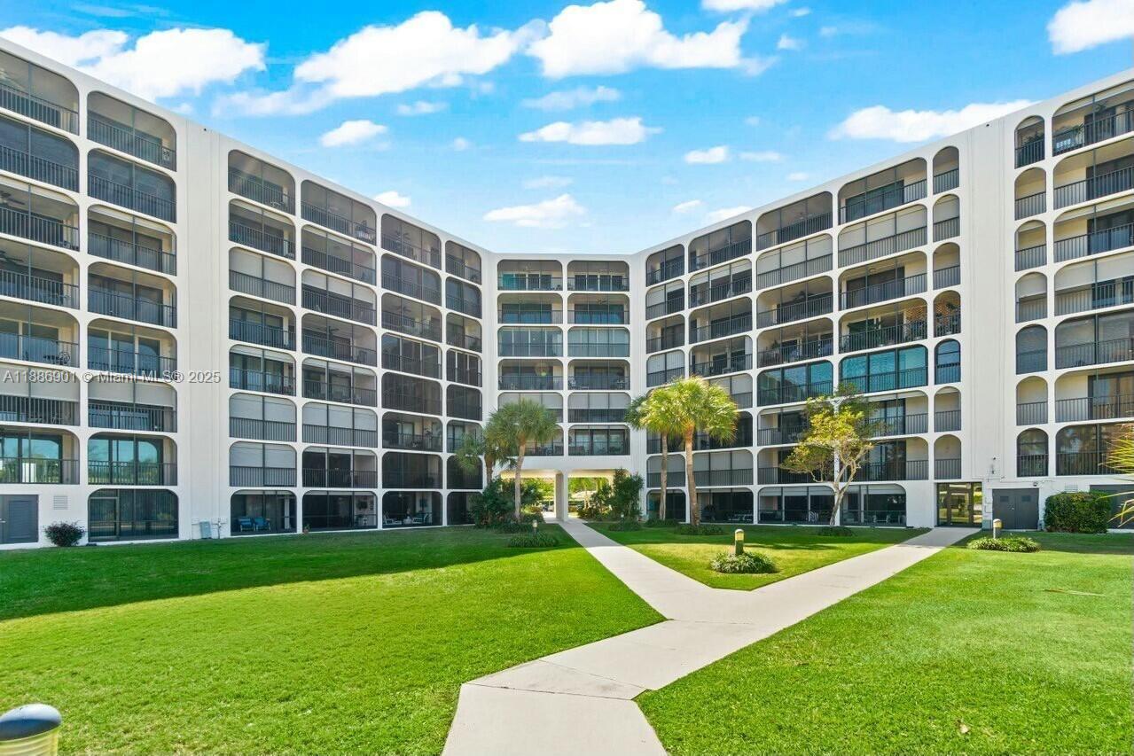 1627 Riverview Road, Unit 212 Deerfield Beach, FL 33441 - Photo 24 of 27 a view of an apartment with a backyard
