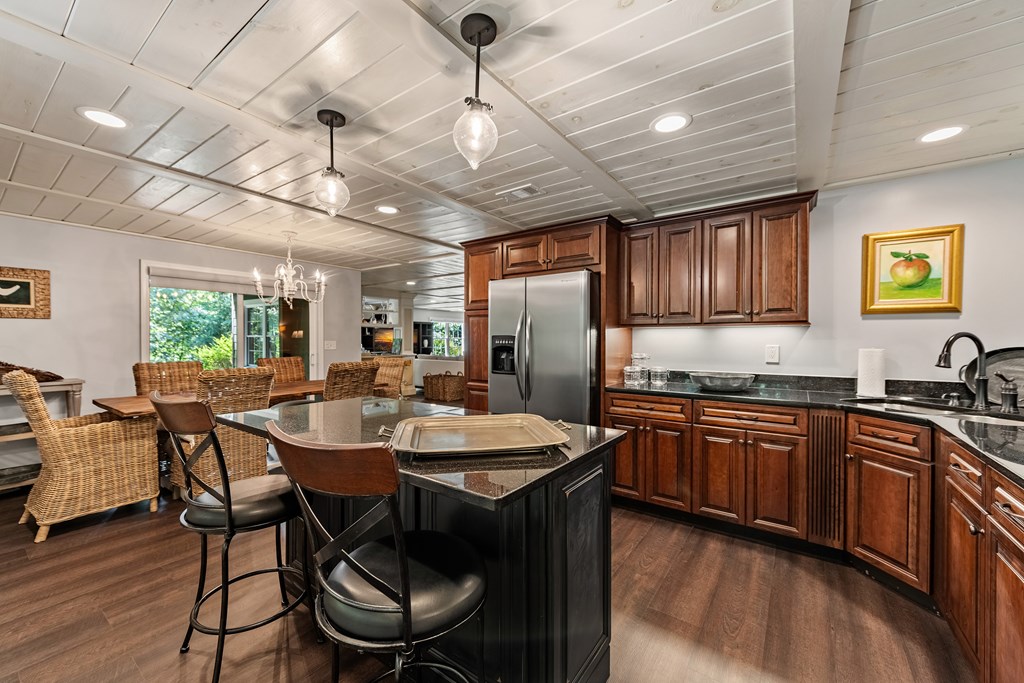 223 Mountain Tops Road Blue Ridge, GA 30513 - Photo 63 of 80 a kitchen with stainless steel appliances granite countertop a sink stove and refrigerator