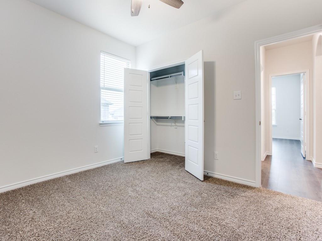 123 Lakeview Circle Pilot Point, TX 76258 - Photo 30 of 39 an empty room with closet and windows