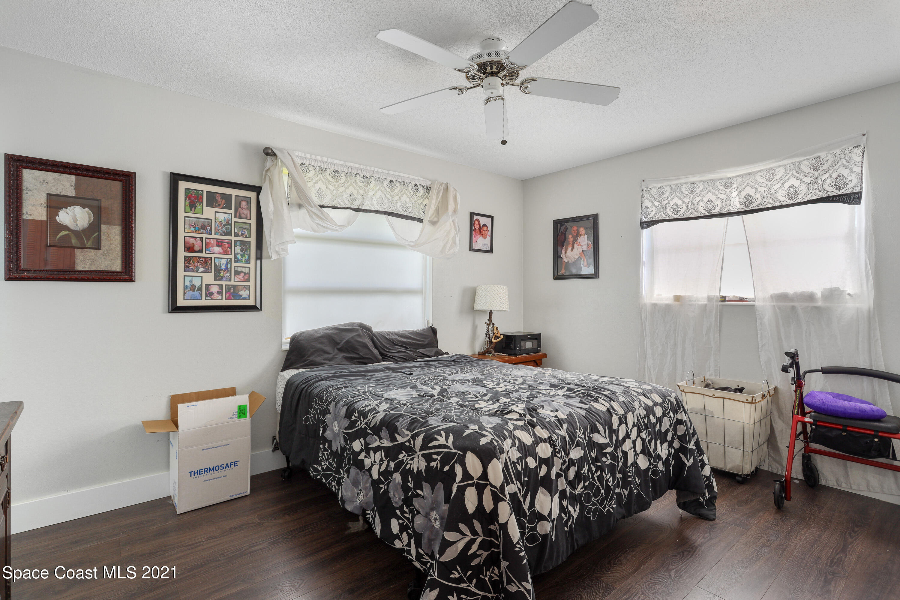 2710 King Richard Road Melbourne, FL 32935 - Photo 11 of 17 a bedroom with a bed and a window