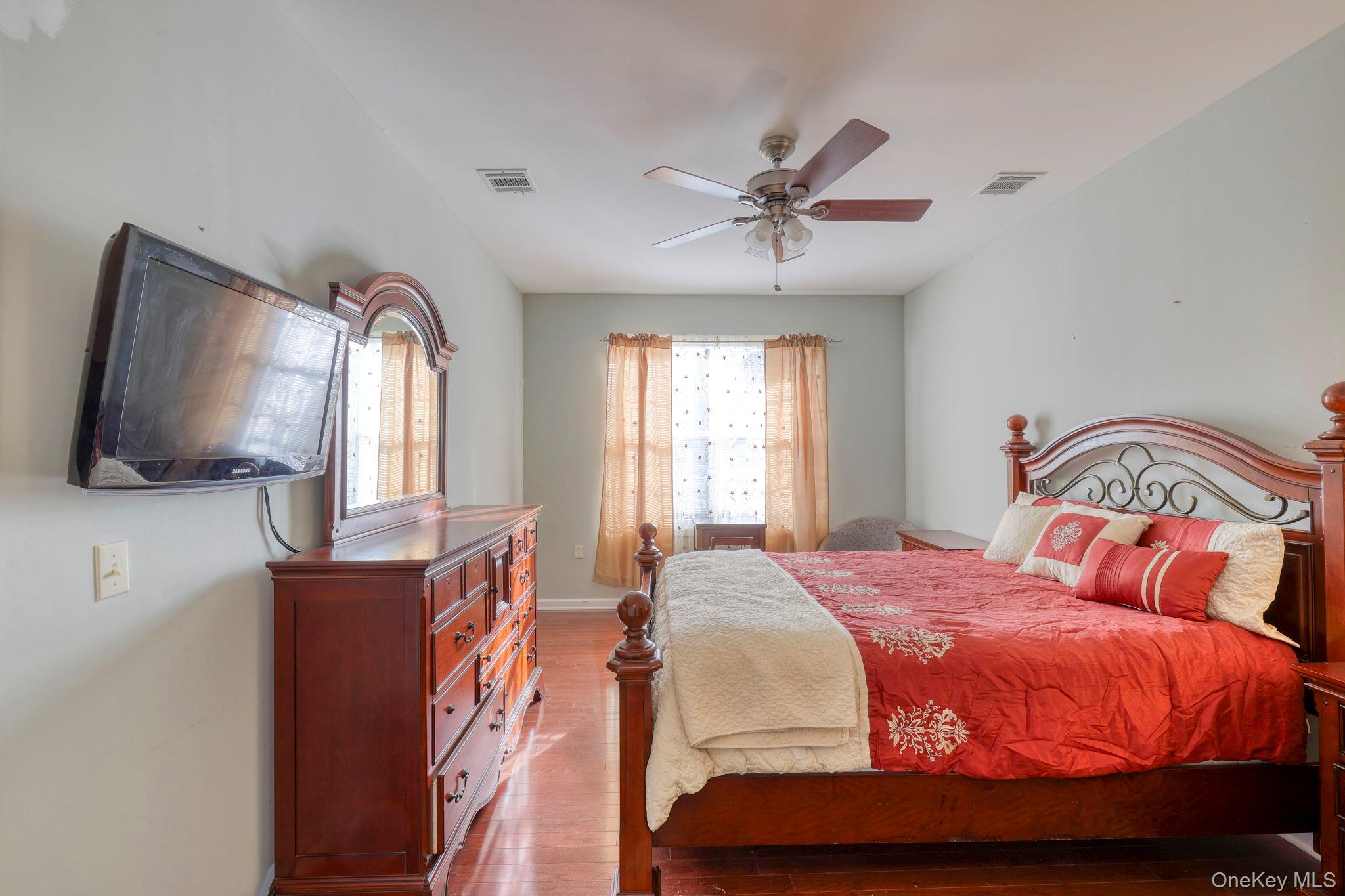 927 Tower Ridge Circle Middletown, NY 10941 - Photo 19 of 36 Bedroom with wood finished floors and ceiling fan