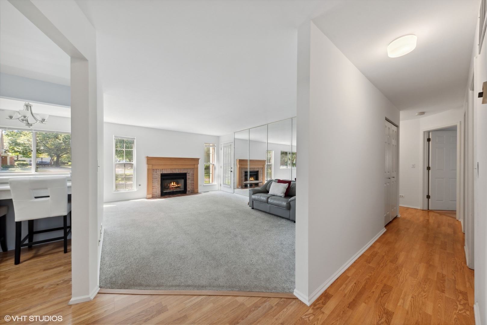 1406 Aldgate Court, Unit D1 Wheeling, IL 60090 - Photo 2 of 16 a view of livingroom with furniture and fireplace