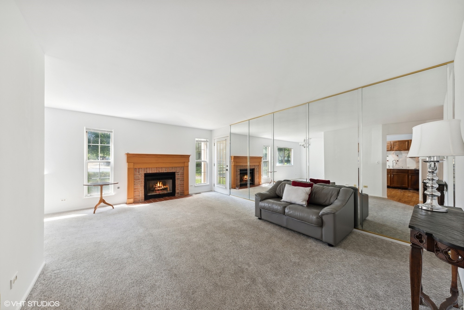 1406 Aldgate Court, Unit D1 Wheeling, IL 60090 - Photo 3 of 16 a living room with furniture and a fireplace
