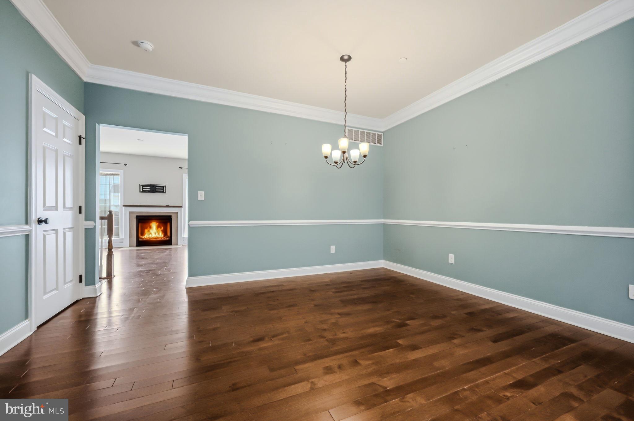 208 Jackdaw Alley, Unit 208 Springfield, PA 19064 - Photo 31 of 49 a view of an empty room with wooden floor