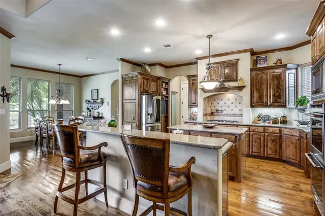 a kitchen with lots of counter top space and appliances