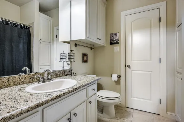 a view of a patio with couches and potted plants