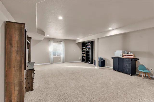 a big room with closet and windows