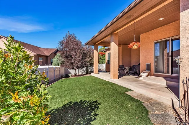a house with trees in the background