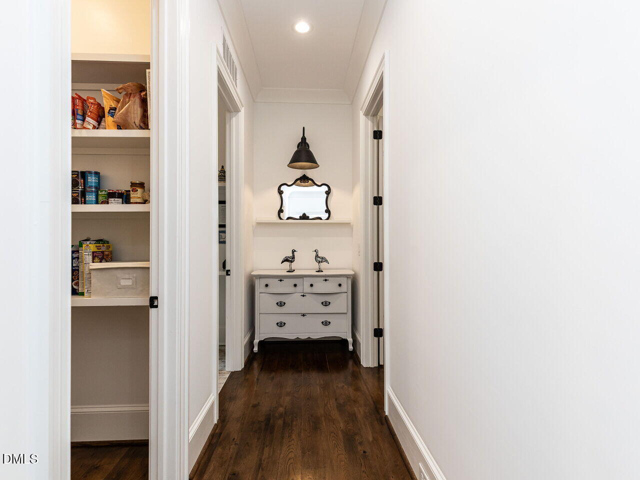 5309 Alpine Drive Raleigh, NC 27609 - Photo 17 of 67 a view of a hallway with cabinet