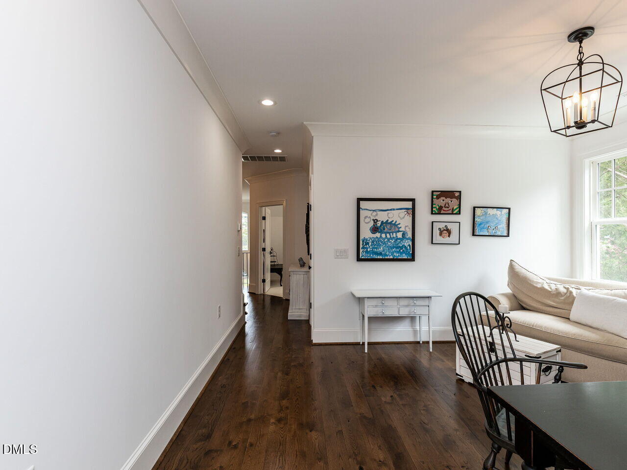 5309 Alpine Drive Raleigh, NC 27609 - Photo 38 of 67 a living room with furniture and a wooden floor