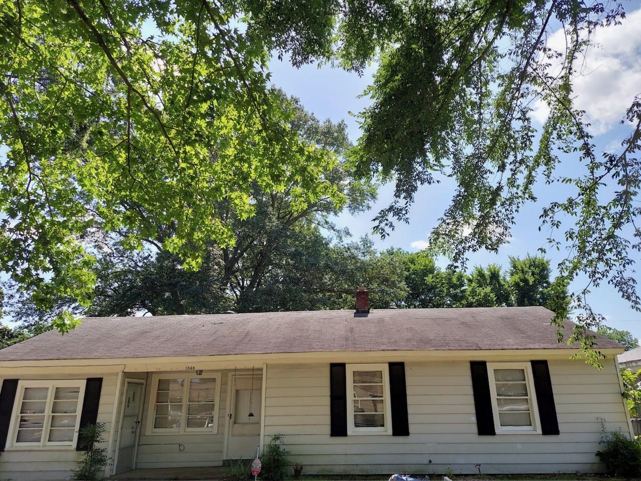 1048 Avon Road Memphis, TN 38122 - Photo 1 of 10 a aerial view of a house with a yard