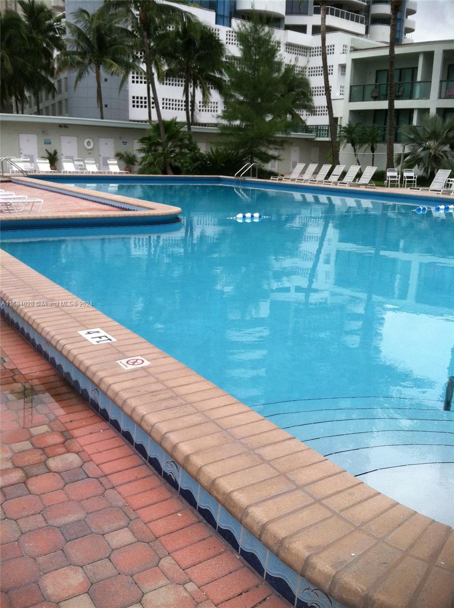 6345 Collins Avenue, Unit 535 Miami Beach, FL 33141 - Photo 3 of 8 a view of lake from a balcony