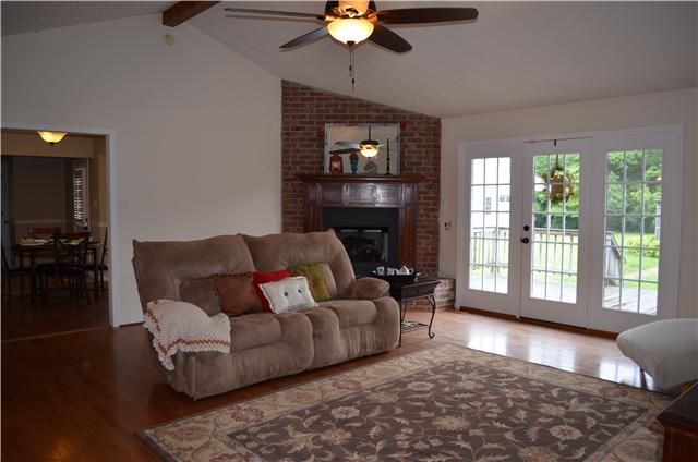 5630 Sango Road Cedar Hill, TN 37032 - Photo 3 of 19 a living room with furniture and a fireplace