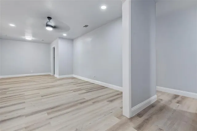 a view of a room with a flat screen tv