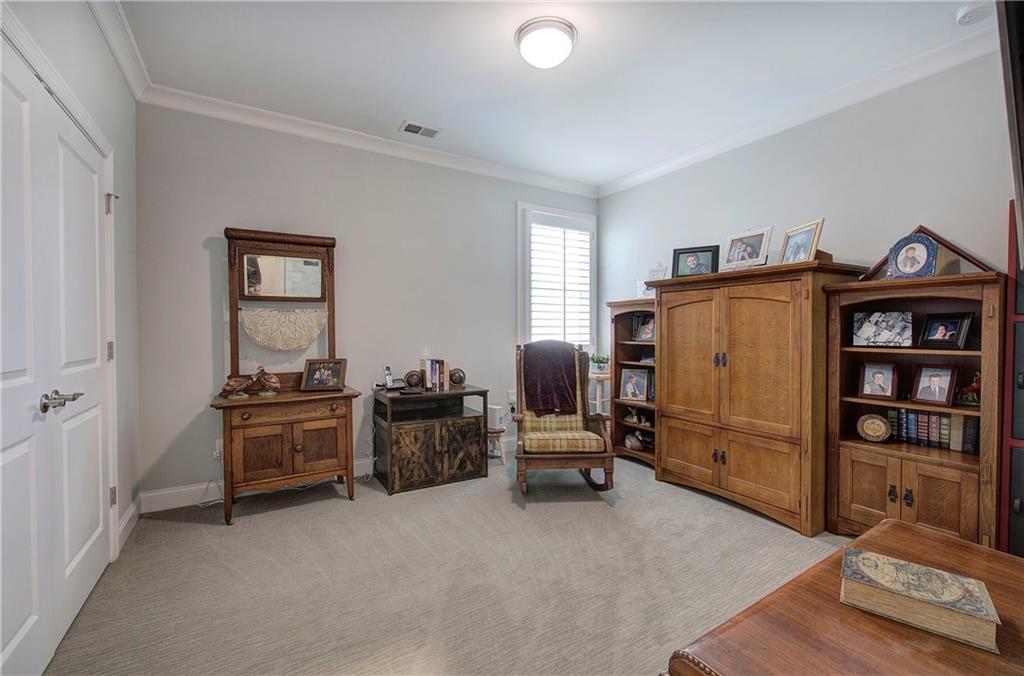 20 Encore Lane Cartersville, GA 30120 - Photo 30 of 44 a view of a workspace with furniture and toys