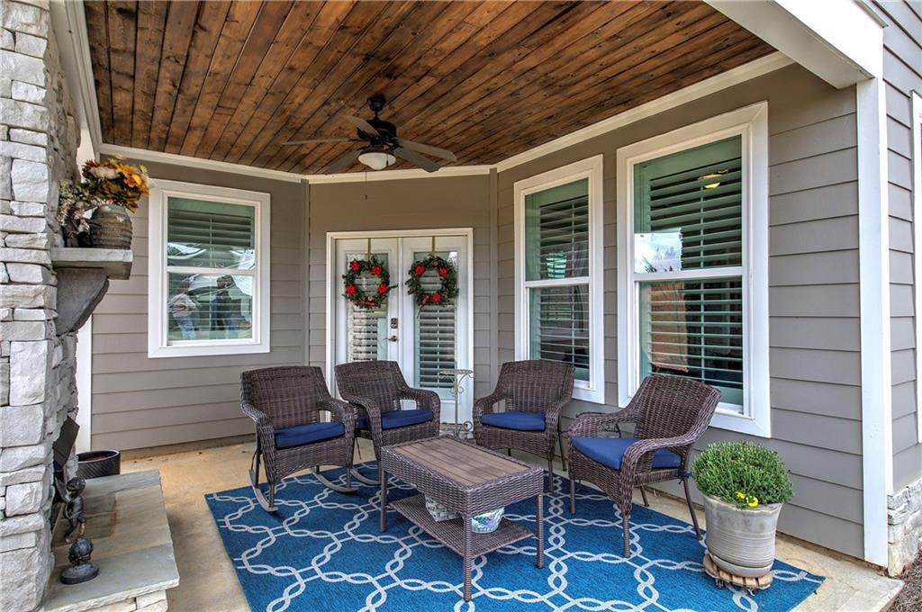 20 Encore Lane Cartersville, GA 30120 - Photo 42 of 44 a outdoor living space with furniture potted plant and a large window