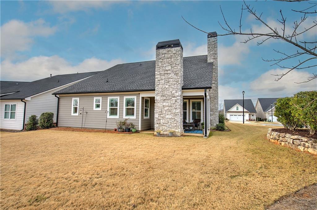 20 Encore Lane Cartersville, GA 30120 - Photo 43 of 44 a view of a house with a yard and large tree