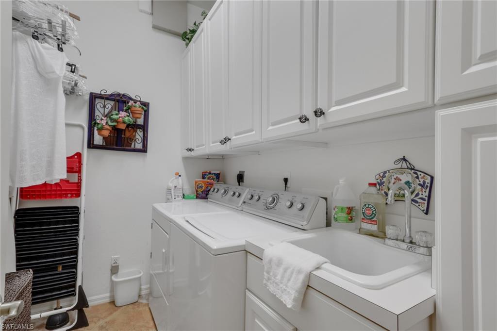10801 Crooked River Road, Unit 203 Estero, FL 34135 - Photo 24 of 27 a bathroom with a sink and a toilet