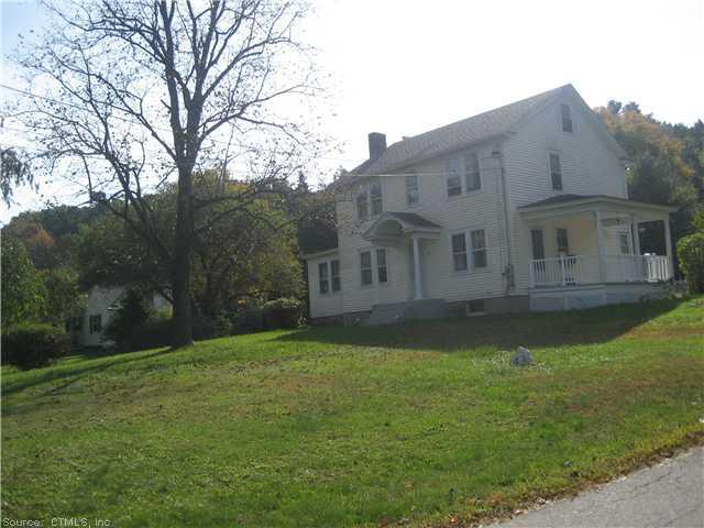a view of house with garden