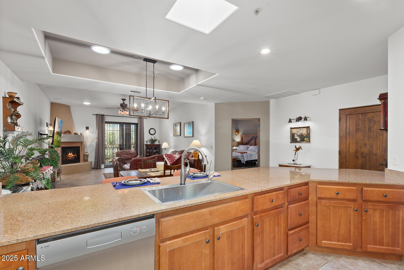 36601 North Mule Train Road, Unit 45B Carefree, AZ 85377 - Photo 12 of 41 a kitchen with counter top space and living room view