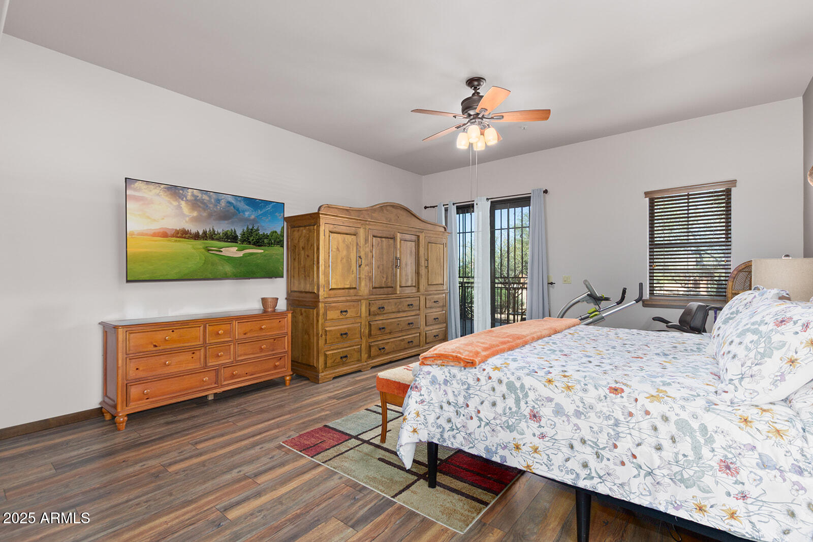 36601 North Mule Train Road, Unit 45B Carefree, AZ 85377 - Photo 17 of 41 a bedroom with a bed and a flat screen tv