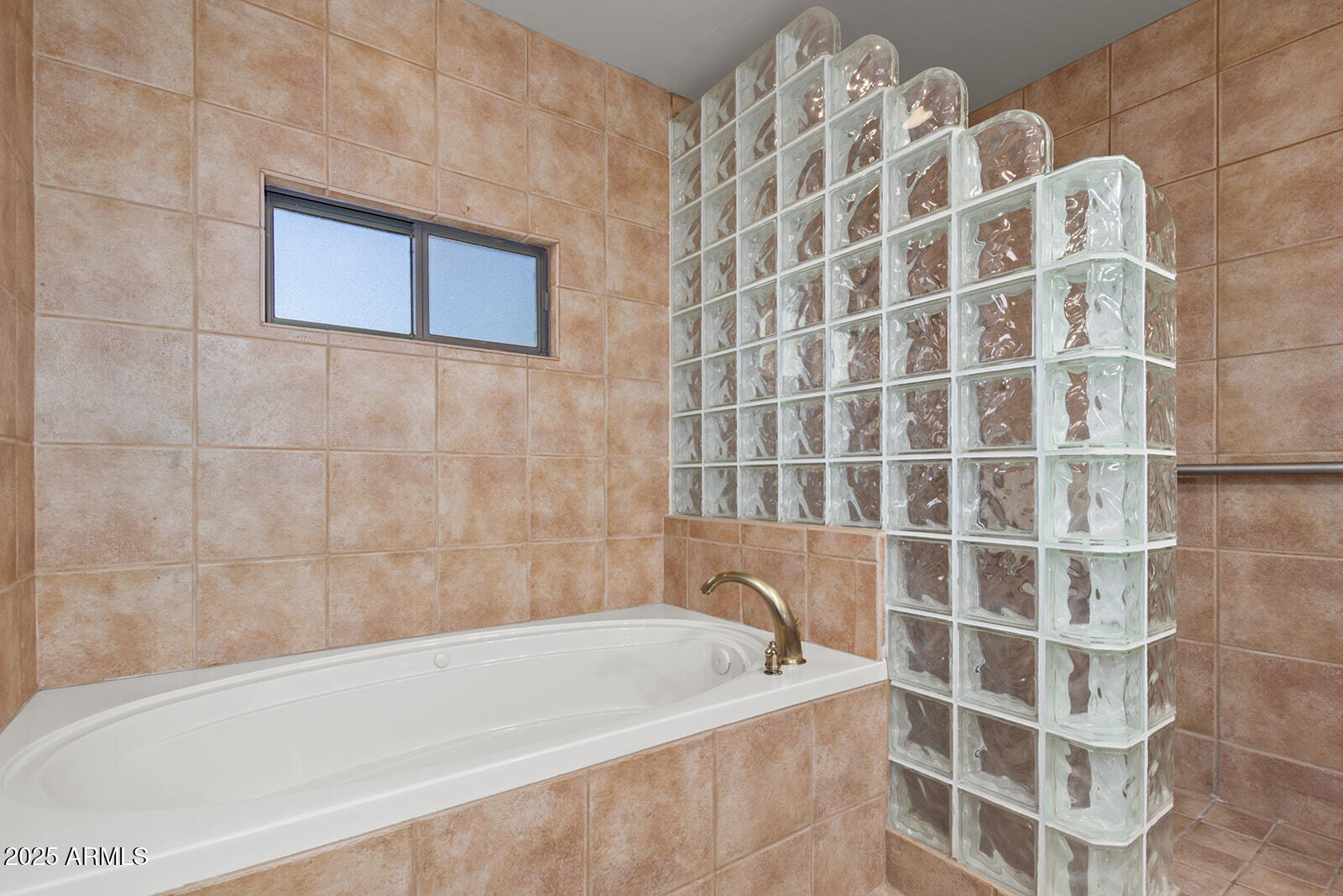 36601 North Mule Train Road, Unit 45B Carefree, AZ 85377 - Photo 19 of 41 a bathroom with a bathtub and shower
