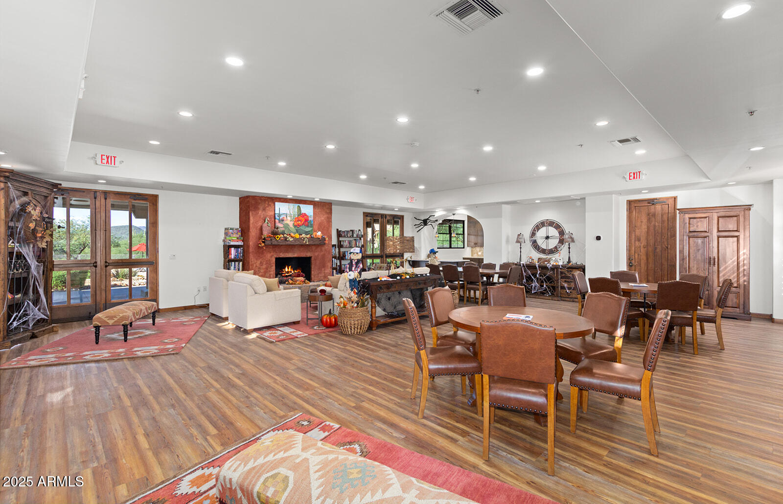 36601 North Mule Train Road, Unit 45B Carefree, AZ 85377 - Photo 40 of 41 a living room with lots of furniture and wooden floor