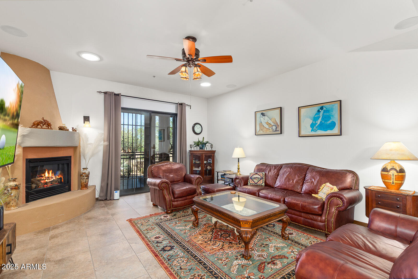 36601 North Mule Train Road, Unit 45B Carefree, AZ 85377 - Photo 8 of 41 a living room with furniture and a fireplace