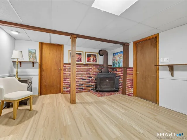 a spacious bedroom with a bed and a cabinets