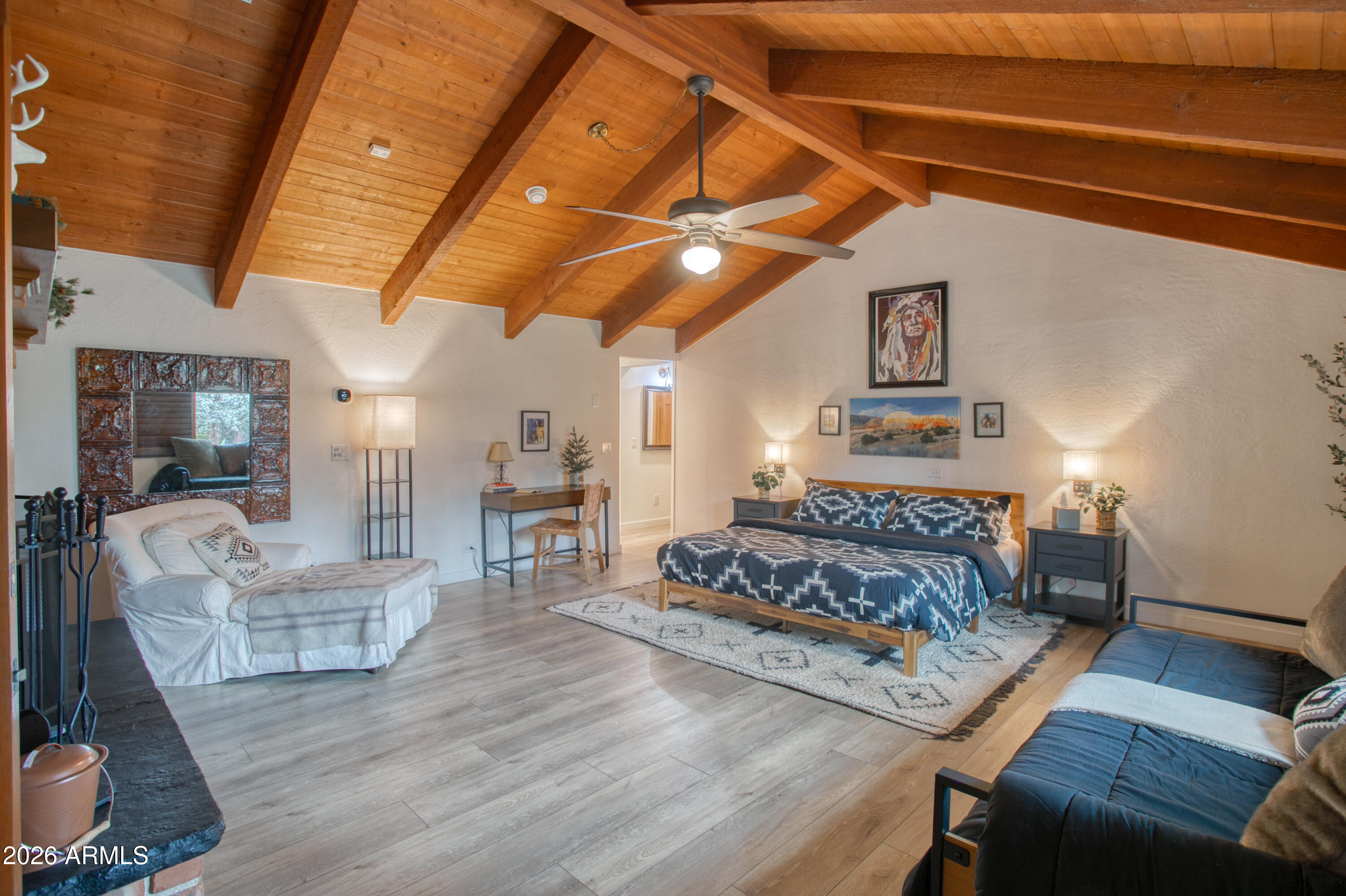 7414 Geronimo Road Pinetop, AZ 85935 - Photo 31 of 67 a living room with furniture and wooden floor