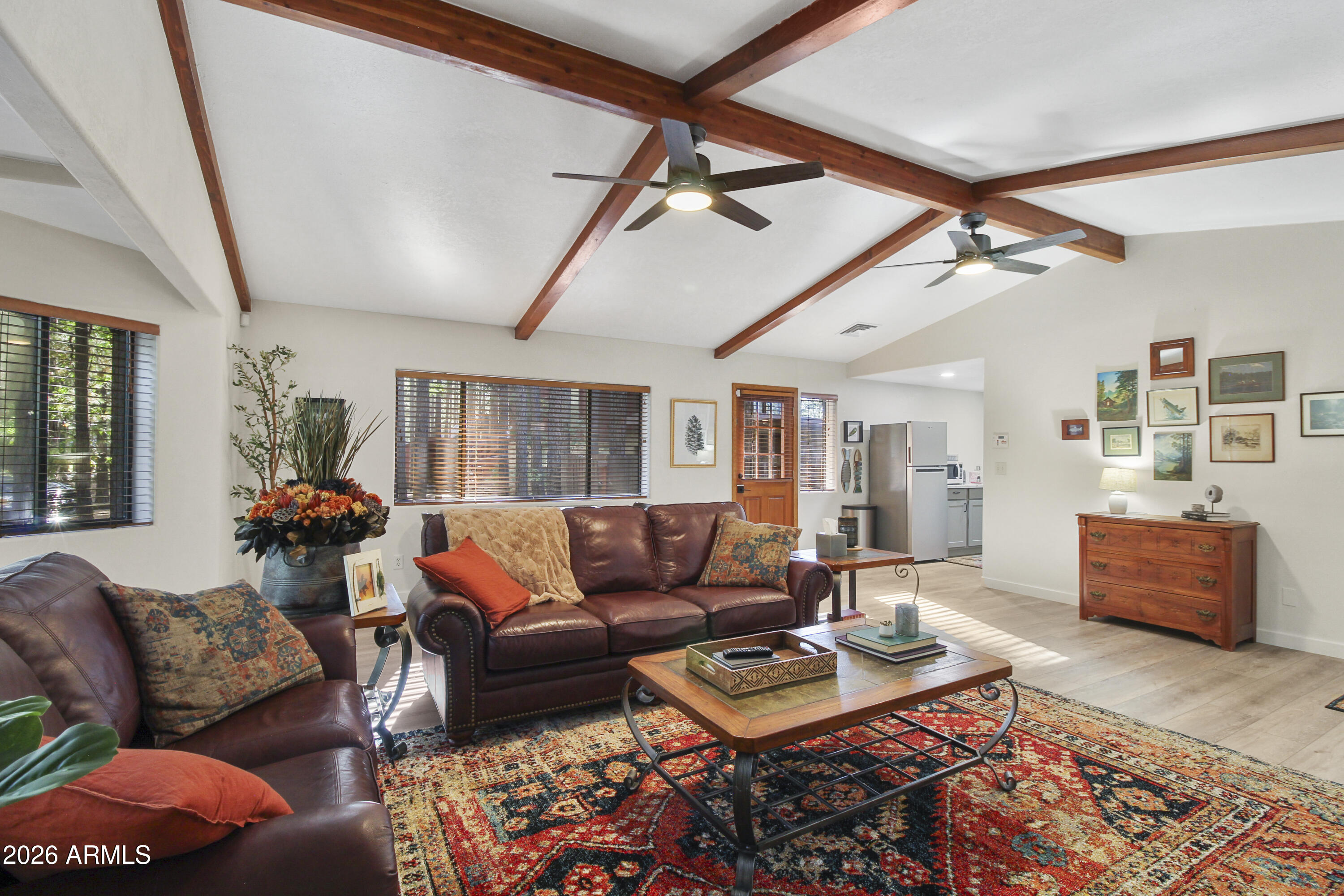 7414 Geronimo Road Pinetop, AZ 85935 - Photo 41 of 67 a living room with furniture and wooden floor