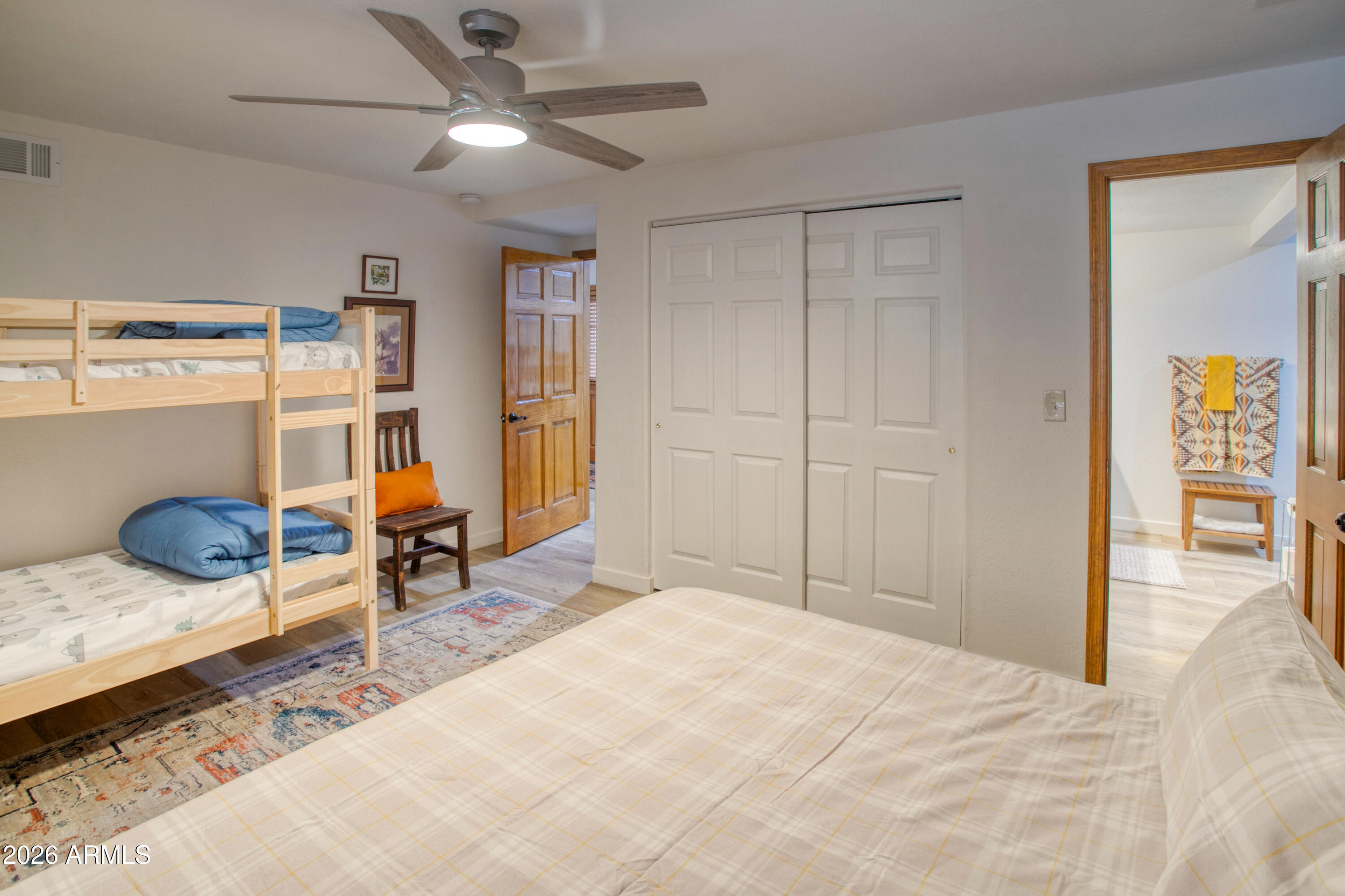 7414 Geronimo Road Pinetop, AZ 85935 - Photo 49 of 67 a bedroom with furniture and a window