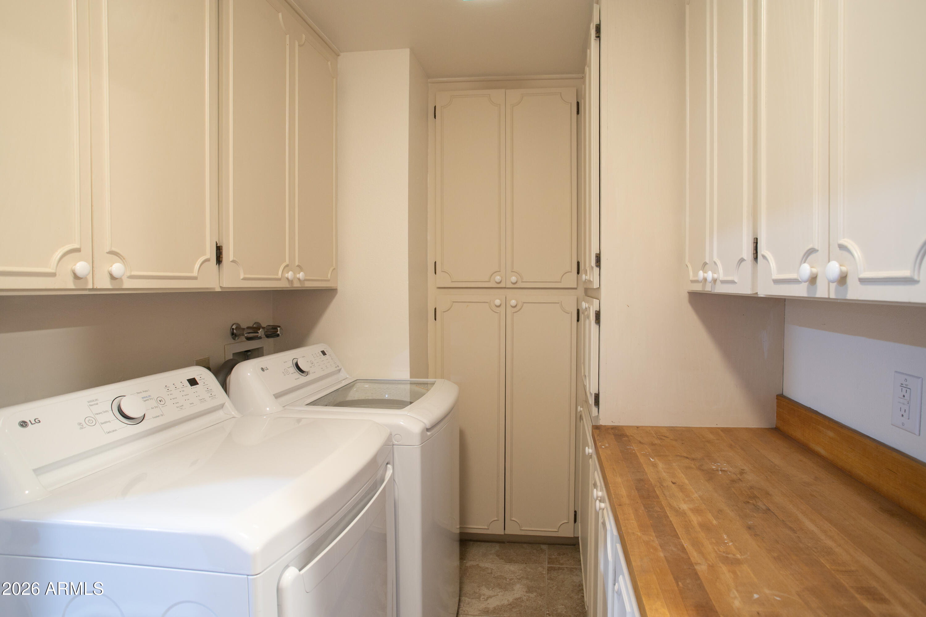 7414 Geronimo Road Pinetop, AZ 85935 - Photo 51 of 67 a utility room with dryer and washer