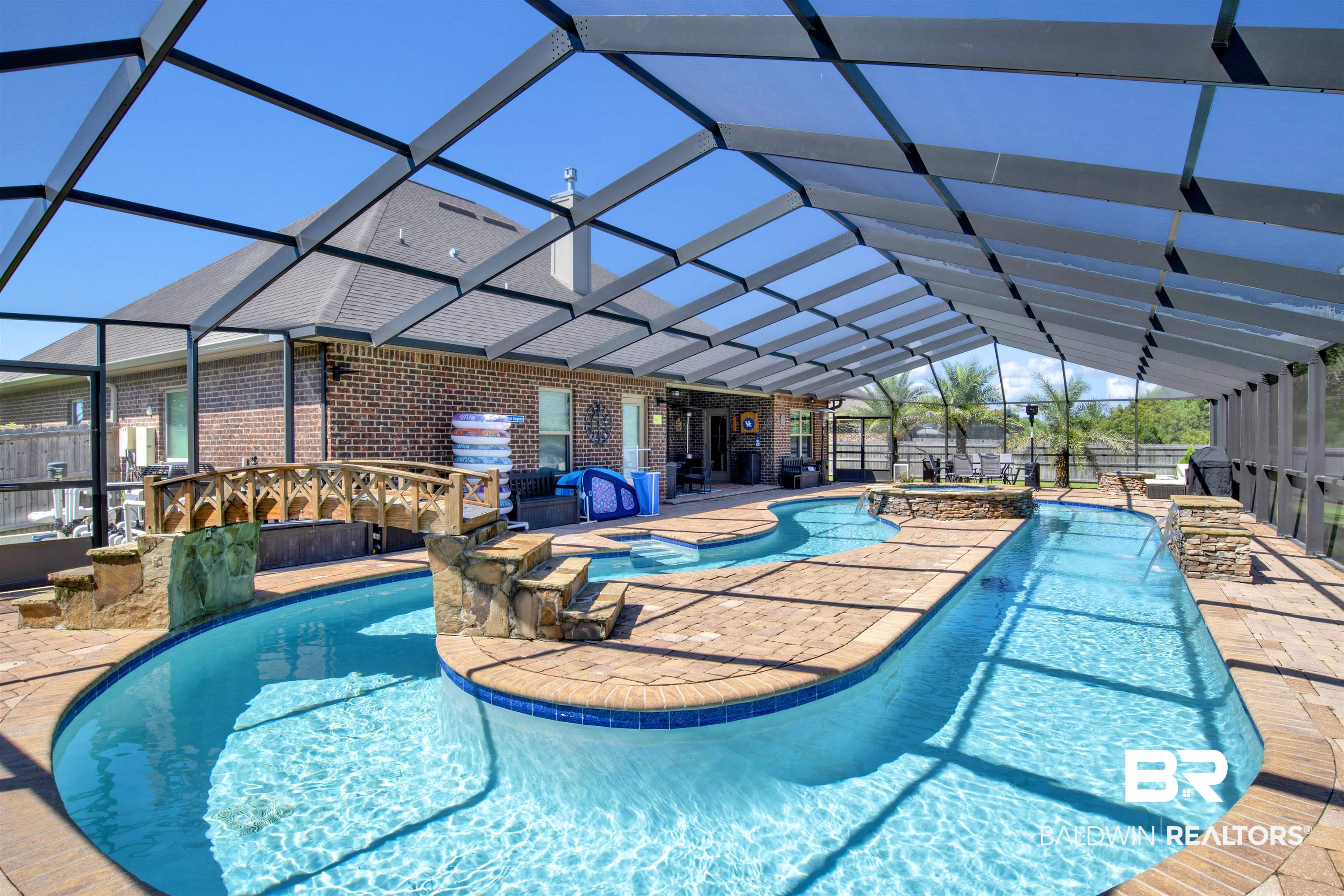 4196 Inverness Circle Gulf Shores, AL 36542 - Photo 35 of 43 View of swimming pool featuring glass enclosure and a patio