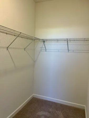 a bathroom with a sink and a window