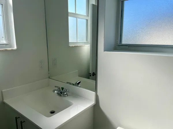 a bathroom with a sink and a toilet