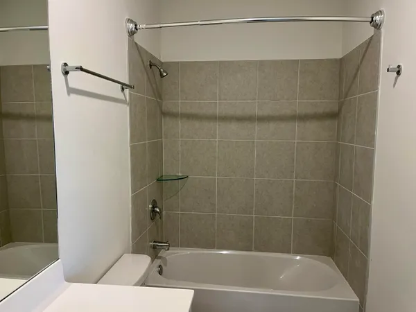 a view of house with a yard