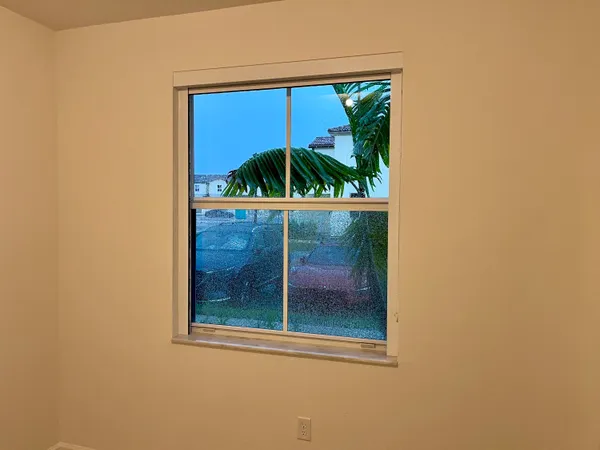 a living room with fireplace furniture and a flat screen tv