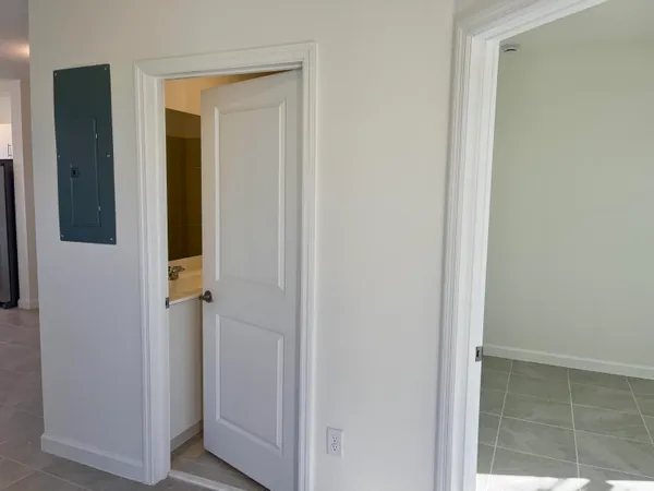 a kitchen with stainless steel appliances a refrigerator and a stove top oven