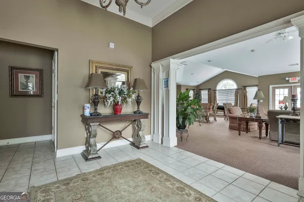 a view of a livingroom with furniture and window