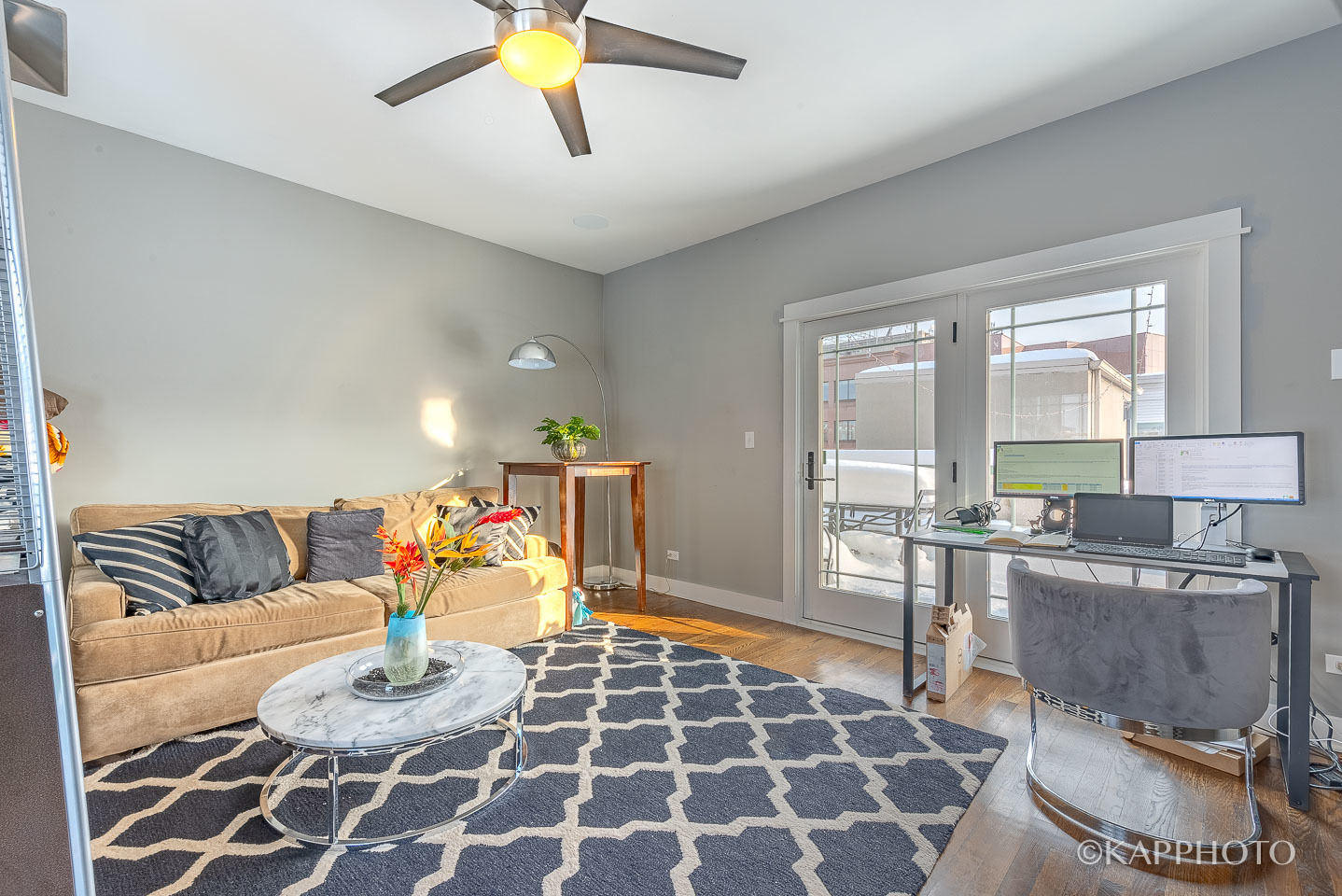 1 North Bishop Street, Unit 15 Chicago, IL 60607 - Photo 13 of 25 a living room with furniture and a rug