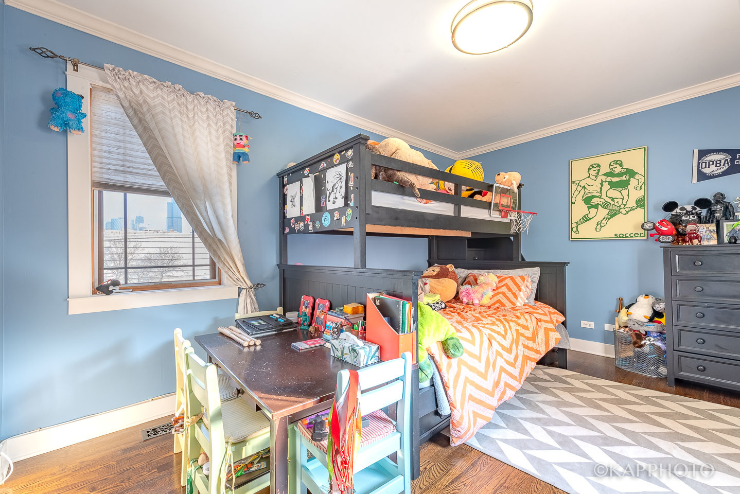 1 North Bishop Street, Unit 15 Chicago, IL 60607 - Photo 15 of 25 a bedroom with furniture and a bed